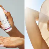 En hand applicerar kräm med SPF 50, bredspektrumskydd mot UVA och UVB, på en annan hand. En glad kvinna i solhatt njuter av solen.