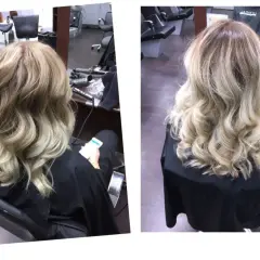 Vackert blont hår med mjuka vågor, perfekt för att locka håret för en festlig look.